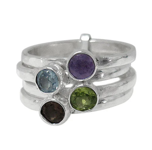 Sterling silver, multi stone (amethyst, blue topaz, peridot, smoky quartz) stack ring with 4 band. Approx size: 12mm Width.