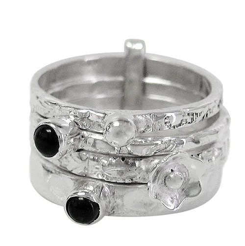 Sterling Silver, stack ring with 4 band and onyx. Approx size: 13mm Width.