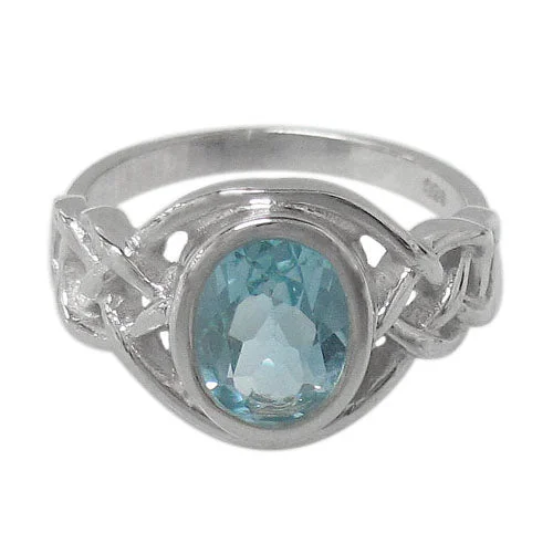 Sterling silver with rhodium, 11x9mm oval stone ring with Celtic knot design.