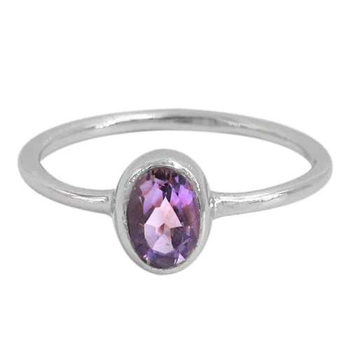 Sterling silver with rhodium, 6x8mm stone ring with 1.5mm round band, colour and size may vary.