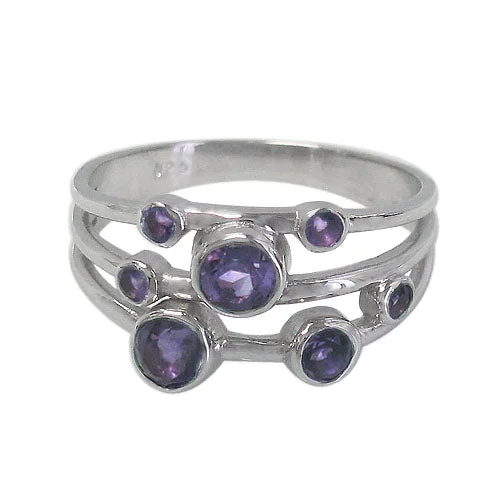 Sterling silver with rhodium ring; 3mm, 4mm and 5mm round stones.